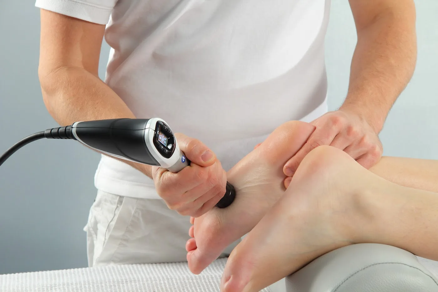 Radial shockwave therapy applied to the arch of the foot